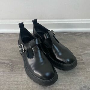 Sleek Black T-Strap Buckle Shoes